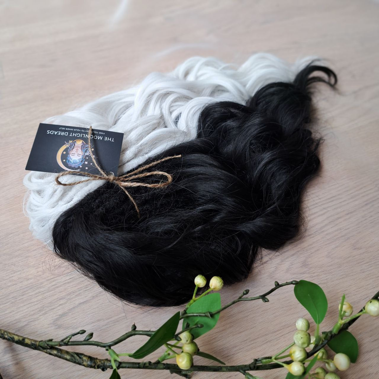 Black & White soft, lightweight, and reusable 60 double ended synthetic standard dreaded brushable curls

Length: 16 inches (40 cm)
Dreaded part: approximately 3-4 inches (8-10 cm)
Weight: ±300 gr (10,6 oz)
