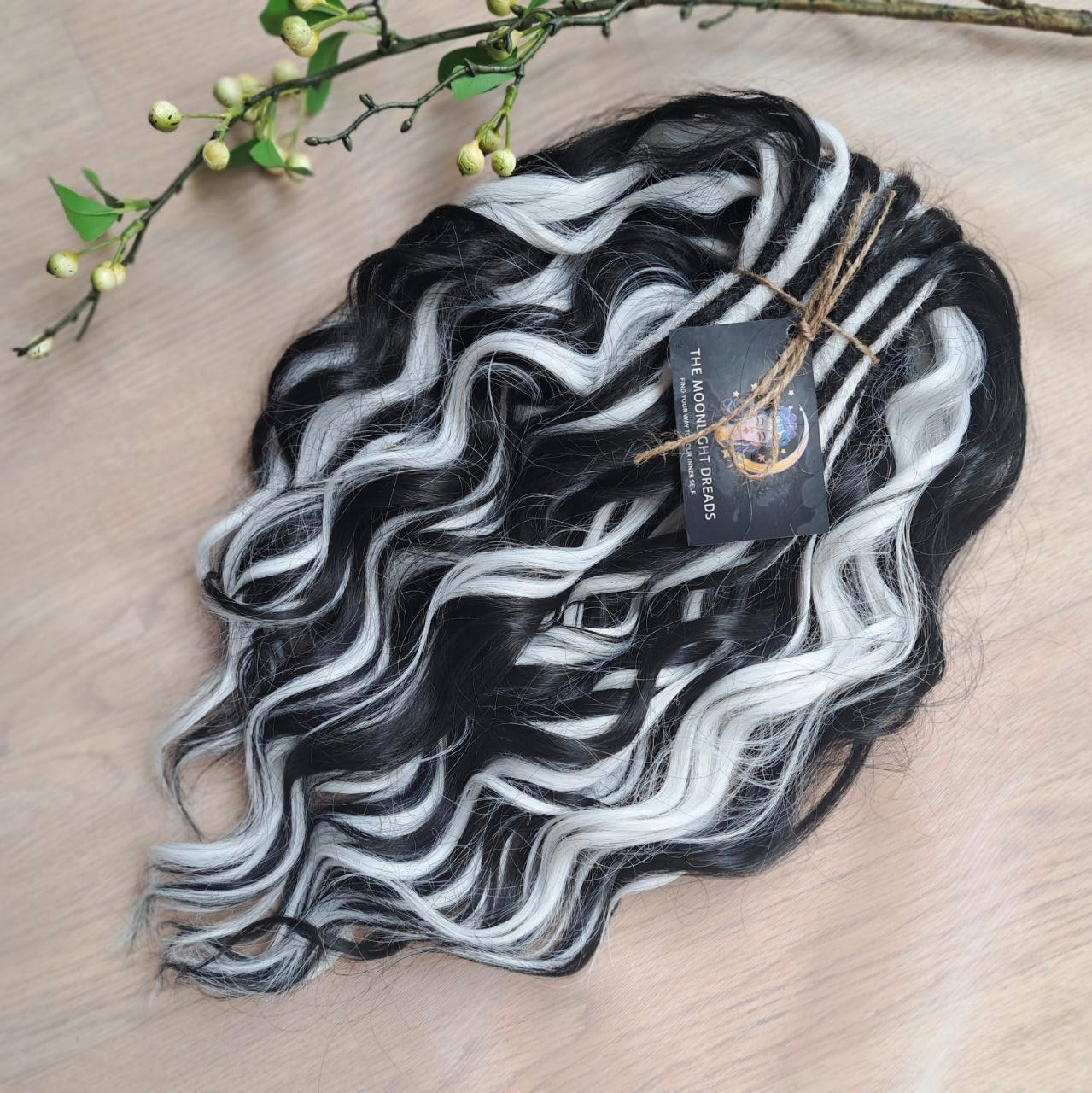 Black & White soft, lightweight, and reusable 60 double ended synthetic standard dreaded brushable curls

Length: 16 inches (40 cm)
Dreaded part: approximately 3-4 inches (8-10 cm)
Weight: ±300 gr (10,6 oz)