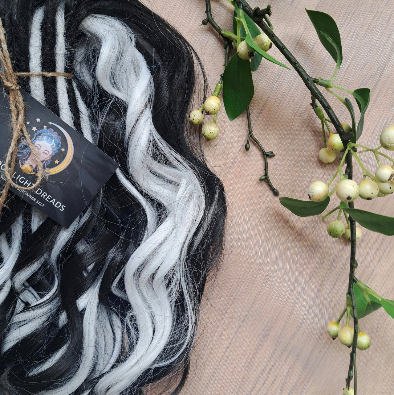 Black & White soft, lightweight, and reusable 60 double ended synthetic standard dreaded brushable curls

Length: 16 inches (40 cm)
Dreaded part: approximately 3-4 inches (8-10 cm)
Weight: ±300 gr (10,6 oz)