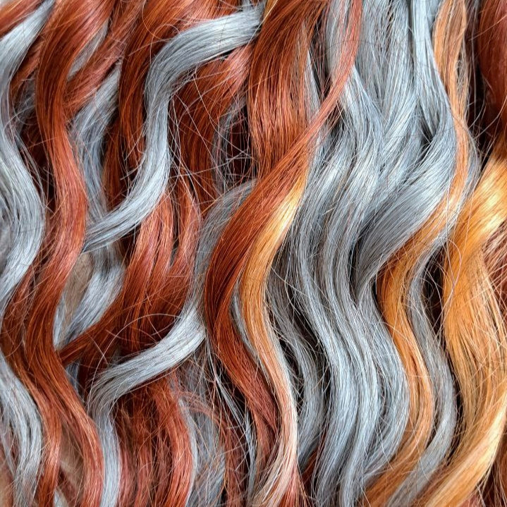Silver Copper Blend: soft, lightweight, and reusable set of curls with a braided middle. A mix of soft silver, warm copper, and light apricot tones - created to blend seamlessly for a client with natural grey hair
