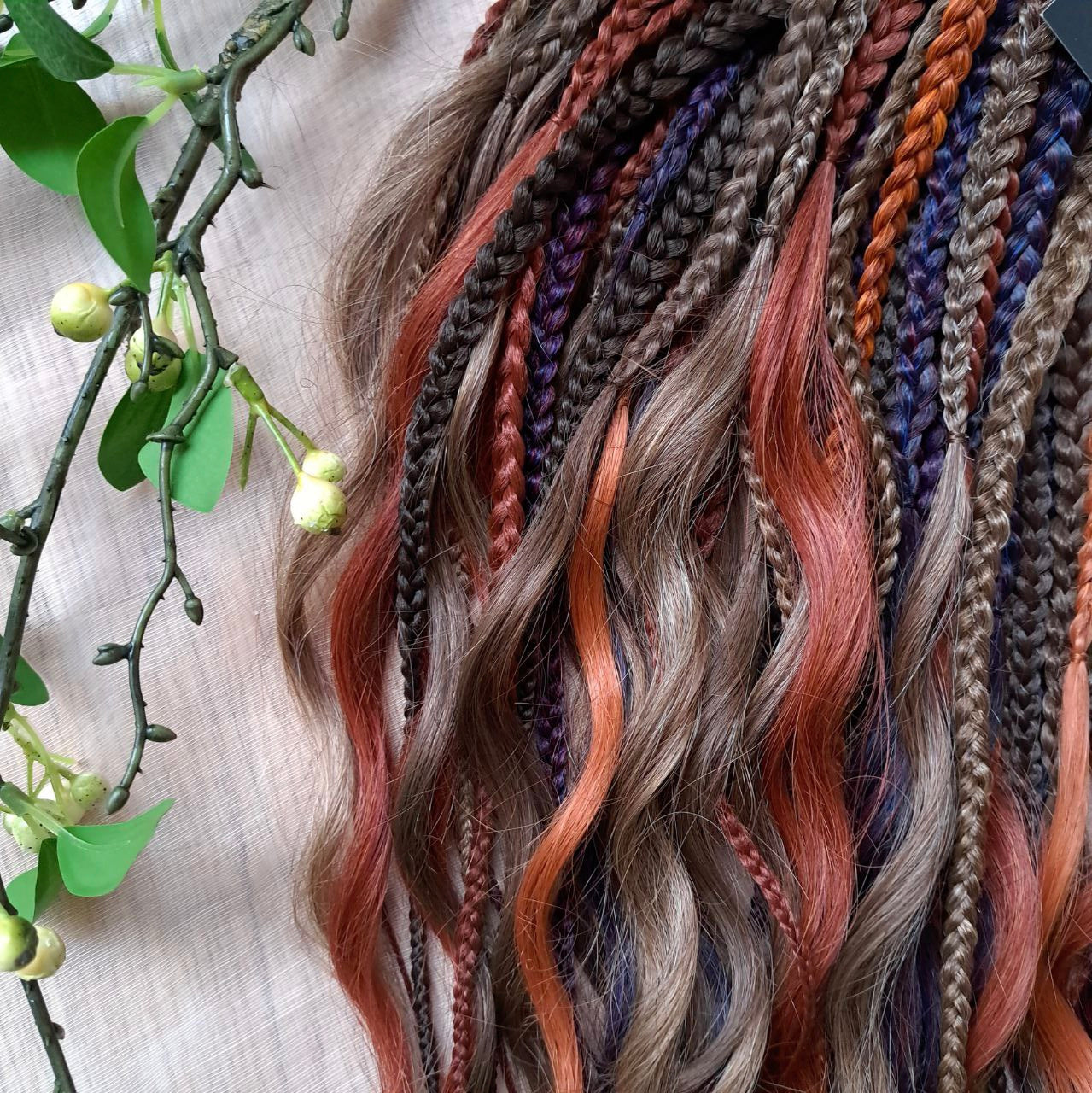 Inspired by the original Spiced Ember set, this version combines regular braids and curls with a braided middle, all in the warmth and depth of autumn hues. Here, rich amber and copper shades are balanced by earthy brown, honey caramel, and subtle chestnut notes — creating a natural yet vibrant color harmony.

Standard length: ±22-24 inches (55-60 cm)
Thickness of braids: ±0.8 cm
Braided part of curls: ±4–5 inches folded (total ±8–10 inches)