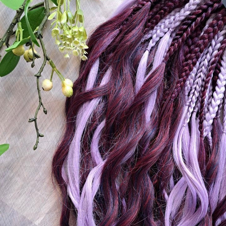 Plum Lilac - the base shade is a deep plum purple, combined with soft lilac strands. Soft, lightweight, and reusable double ended synthetic brushable curls.