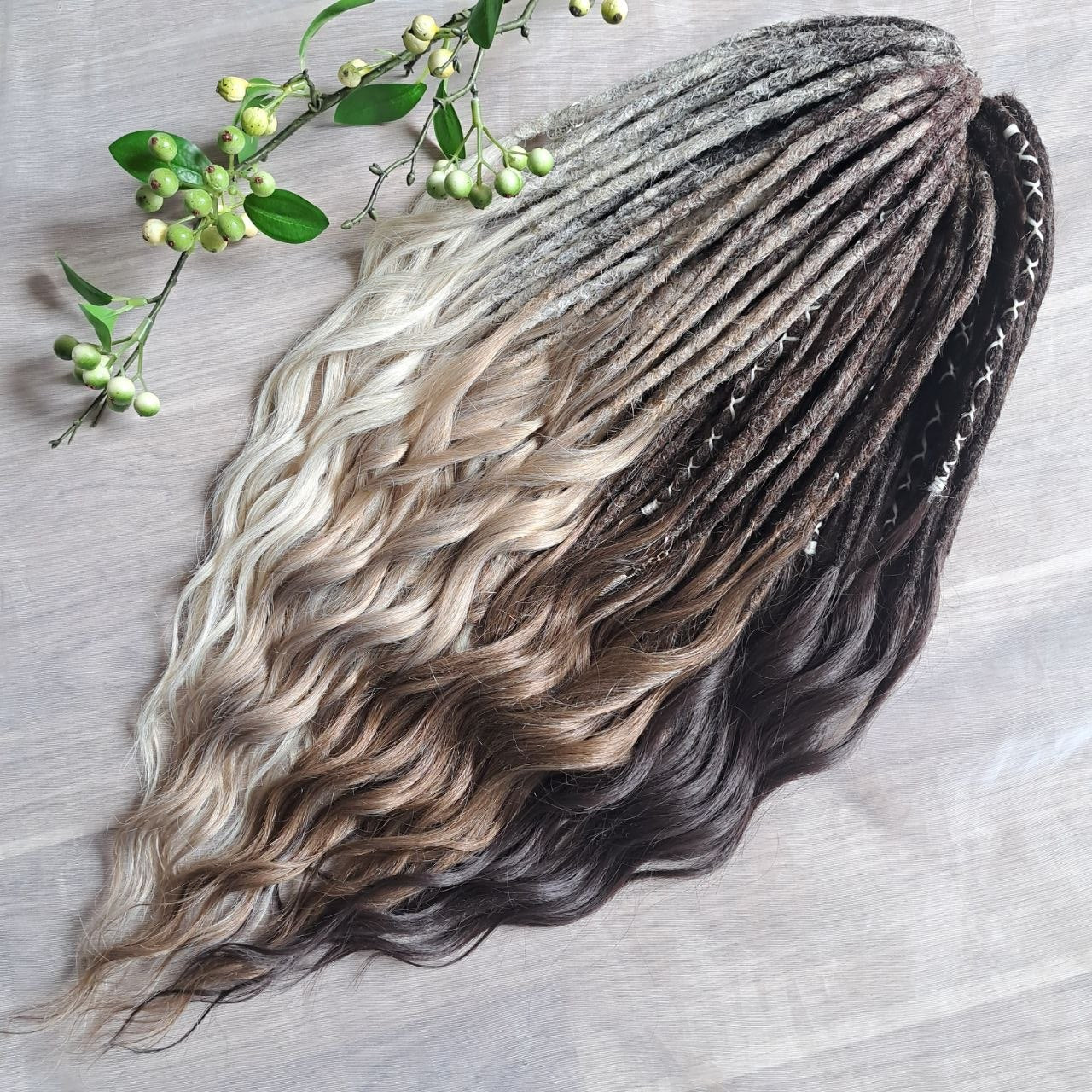 Soft, lightweight,  reusable synthetic double ended crochet dreadlocks, with curly brushable ends (colors based on the colors from the Smoky Mix set):

- chocolate brown;
- ombre from medium to light brown;
- ashy wheat blonde with dark roots;
- light blonde with dark roots.

