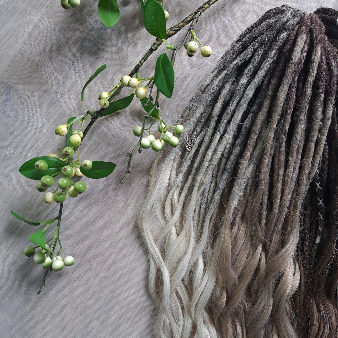 Soft, lightweight,  reusable synthetic double ended crochet dreadlocks, with curly brushable ends (colors based on the colors from the Smoky Mix set):

- chocolate brown;
- ombre from medium to light brown;
- ashy wheat blonde with dark roots;
- light blonde with dark roots.
