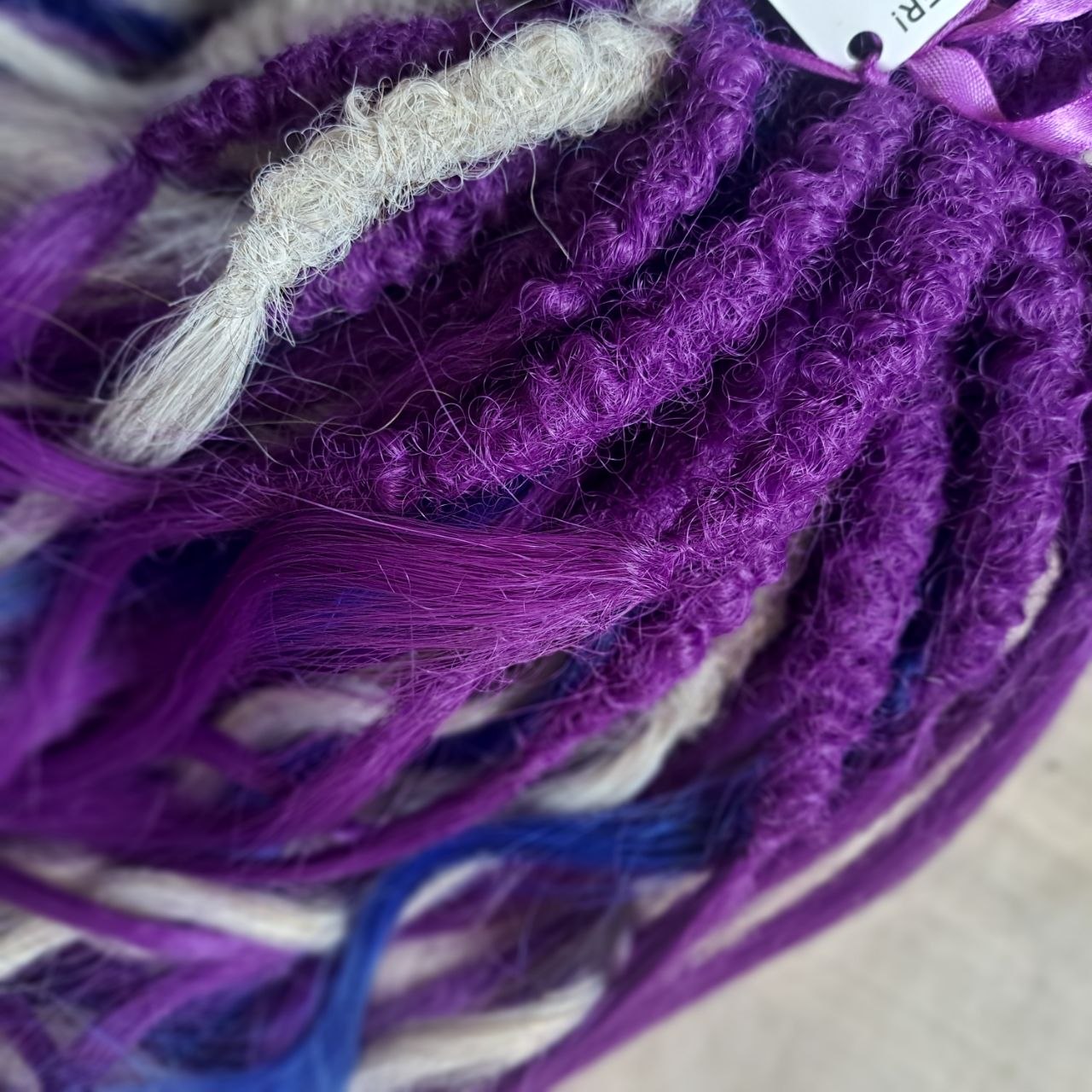 https://themoonlightdreads.com/products/ready-to-ship-purple-blend-brushable-pushup-curls