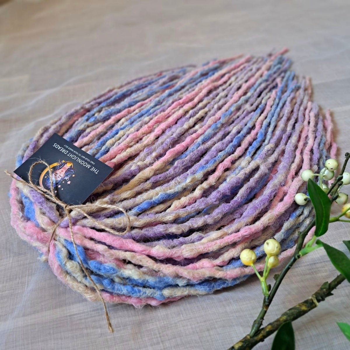 Pastel Cloud - a soft pastel mix of lavender, baby blue, blush pink, and creamy blonde. Soft, lightweight, and reusable 49 double ended synthetic bumpy dreadlocks with blunt ends give a calm, airy look.

Length: ≈15-16 inches (≈38-40 cm)
Thickness of dreads and braids: ≈0.8-1 cm
Weight: ≈260 gr (≈9,17 oz)