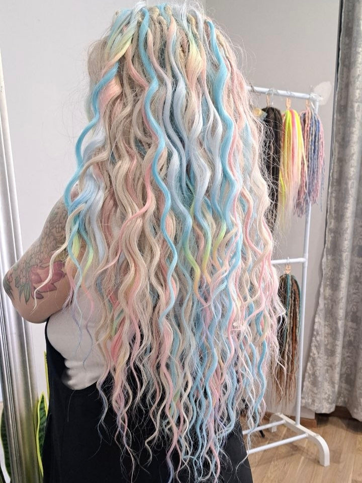 Second Life: Cotton Candy - 50 DE synthetic regular dreaded brushable curls (one-side dreaded part). A blend of platinum blonde, sky blue, pink, and rainbow colors.  Worn once . Has been washed and corrected. Good condition (a bit damaged ends).