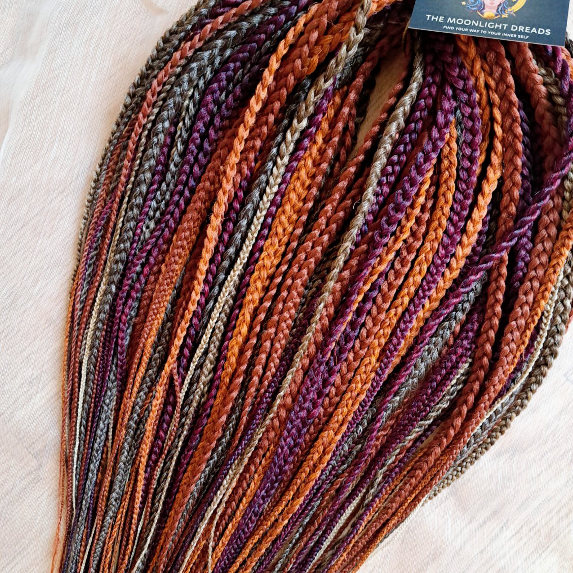 Inspired by the original Spiced Amber set, this braided version combines all the warmth and depth of autumn hues in a new texture and tone. Here, rich amber and copper shades are balanced by earthy brown, honey caramel, and subtle chestnut notes — creating a natural yet vibrant color harmony.