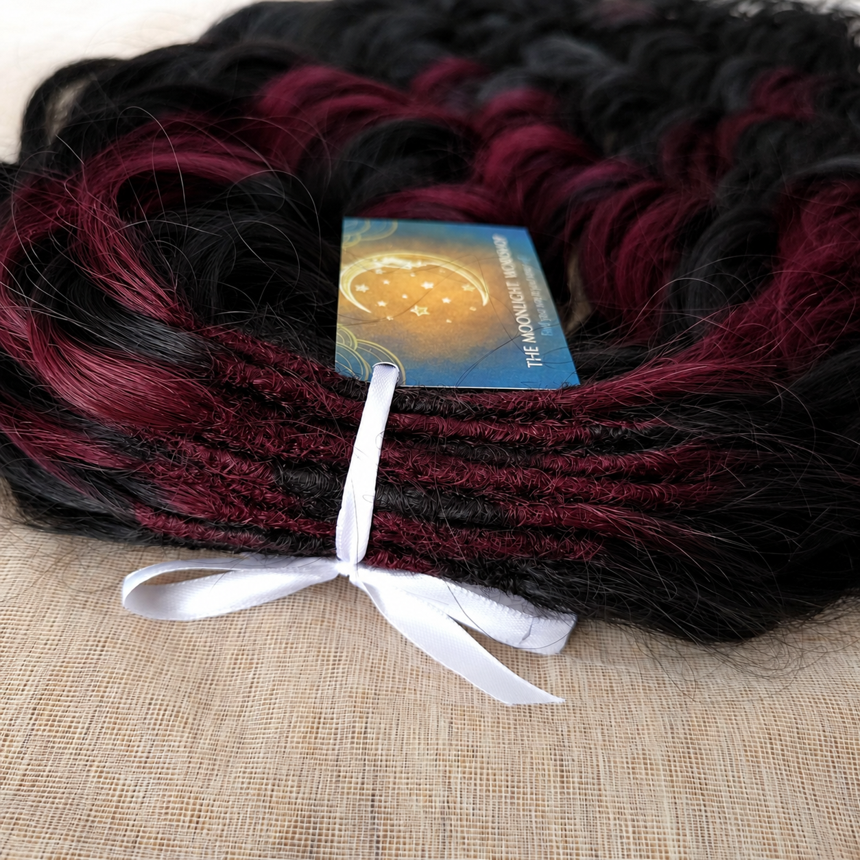 A mix of black and rich burgundy: soft, lightweight, and reusable synthetic brushable double ended wavy dreadlocks.

The length:
Standard dreaded - 22-24 inches (55-60 cm), dreaded part ±4-5 inches
Braided middle - 22-24 inches (55-60 cm), braid ±4-5 inches folded (total ±8-10 inches)
Push-up / Dolly - 20-22 inches (50-55 cm), dreaded part ±4 inches (from working side)