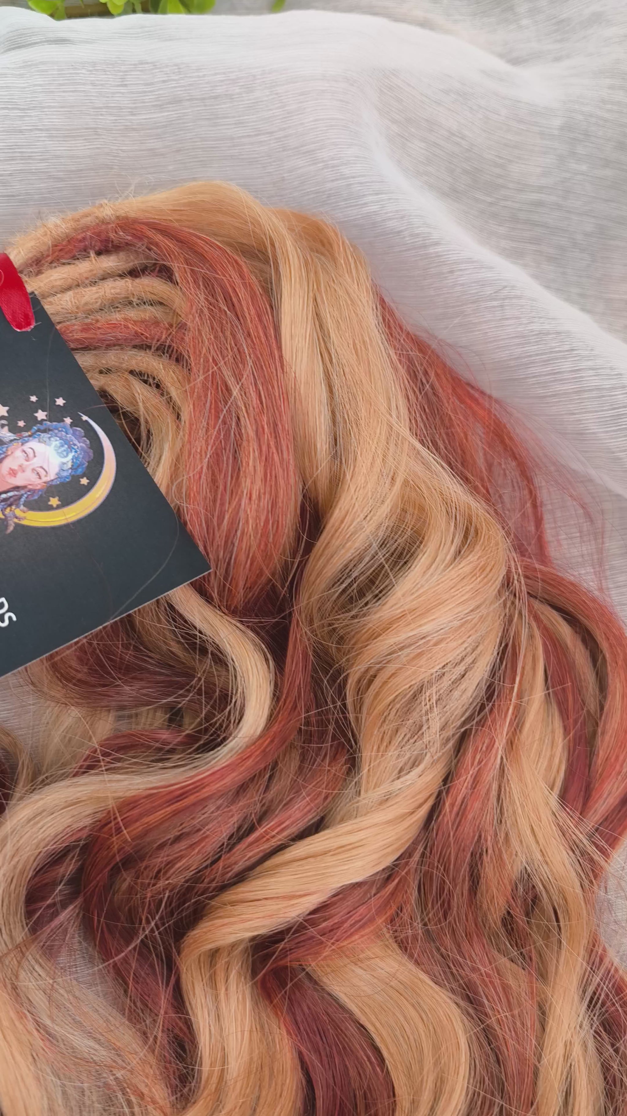 Copper Honey - 60 DE soft, lightweight, and reusable synthetic standard dreaded brushable curls Manasi. Peach blonde base mixed with copper red.
