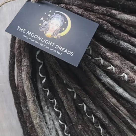 Soft, lightweight,  reusable synthetic double ended crochet dreadlocks, with curly brushable ends (colors based on the colors from the Smoky Mix set):

- chocolate brown;
- ombre from medium to light brown;
- ashy wheat blonde with dark roots;
- light blonde with dark roots.
