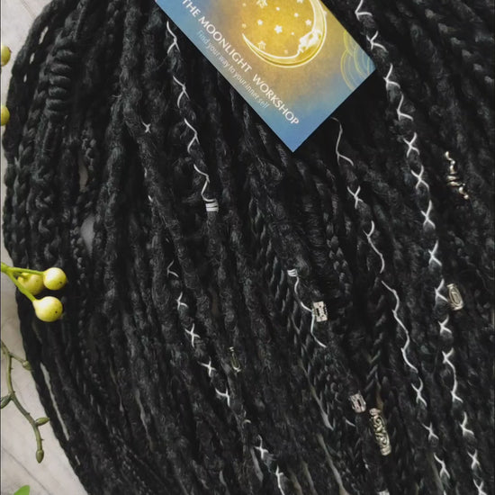 This set of synthetic dreadlocks combines elements of a Viking-inspired aesthetic.
Black double ended crochet dreads, braids, and Senegalese twists. Decoration is included. Reusable lightweight set made from high-quality synthetic hypoallergenic material kanekalon.

Standard length: ±22-24 inches (55-60 cm)
Thickness of dreads and braids: ±0.8 cm