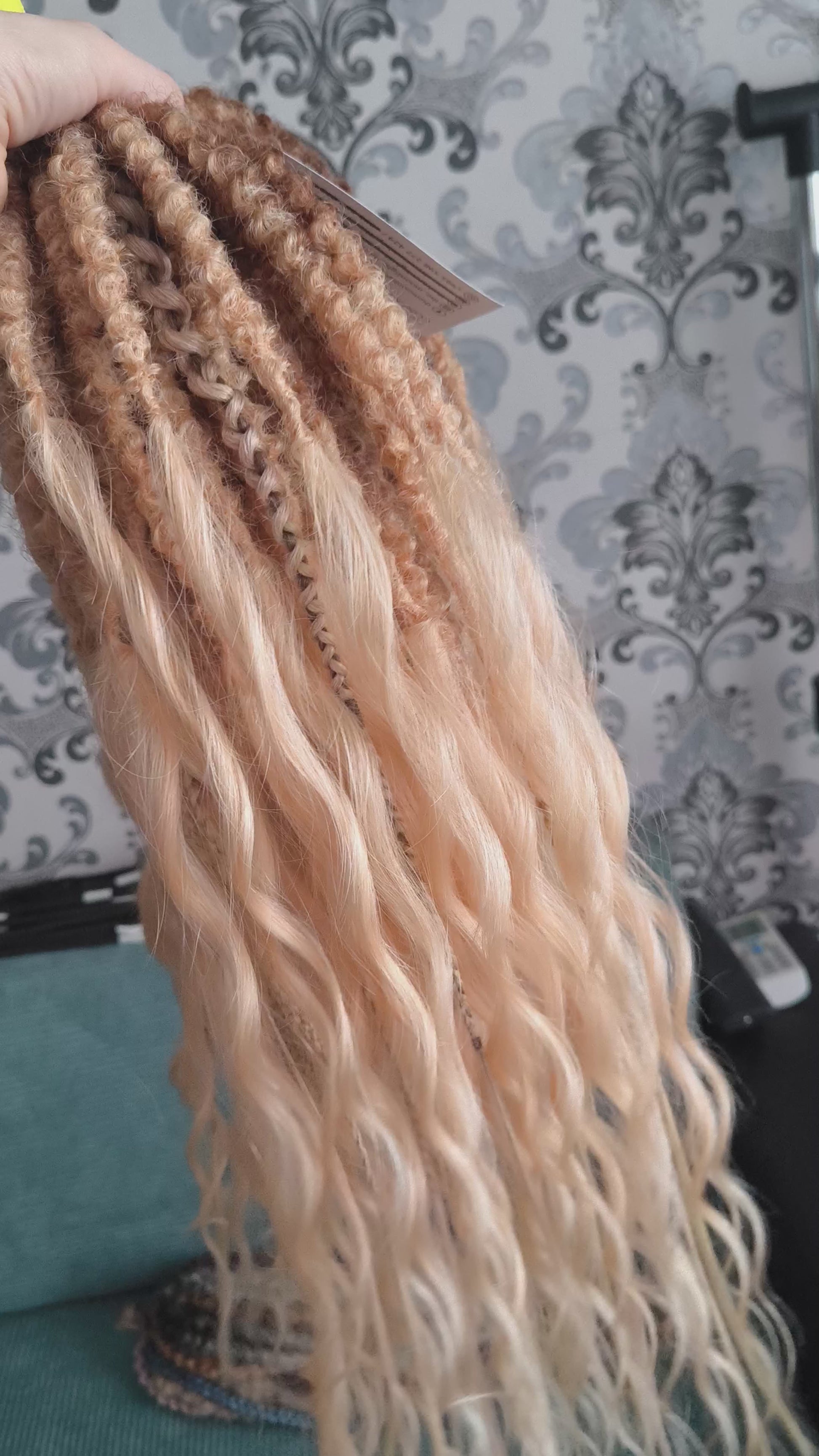 Soft, lightweight, and reusable synthetic brushable double ended wavy dreadlocks. The base starts with a warm chocolate chestnut at the roots, blending seamlessly into a sandy honey blonde with subtle creamy peach undertones. 