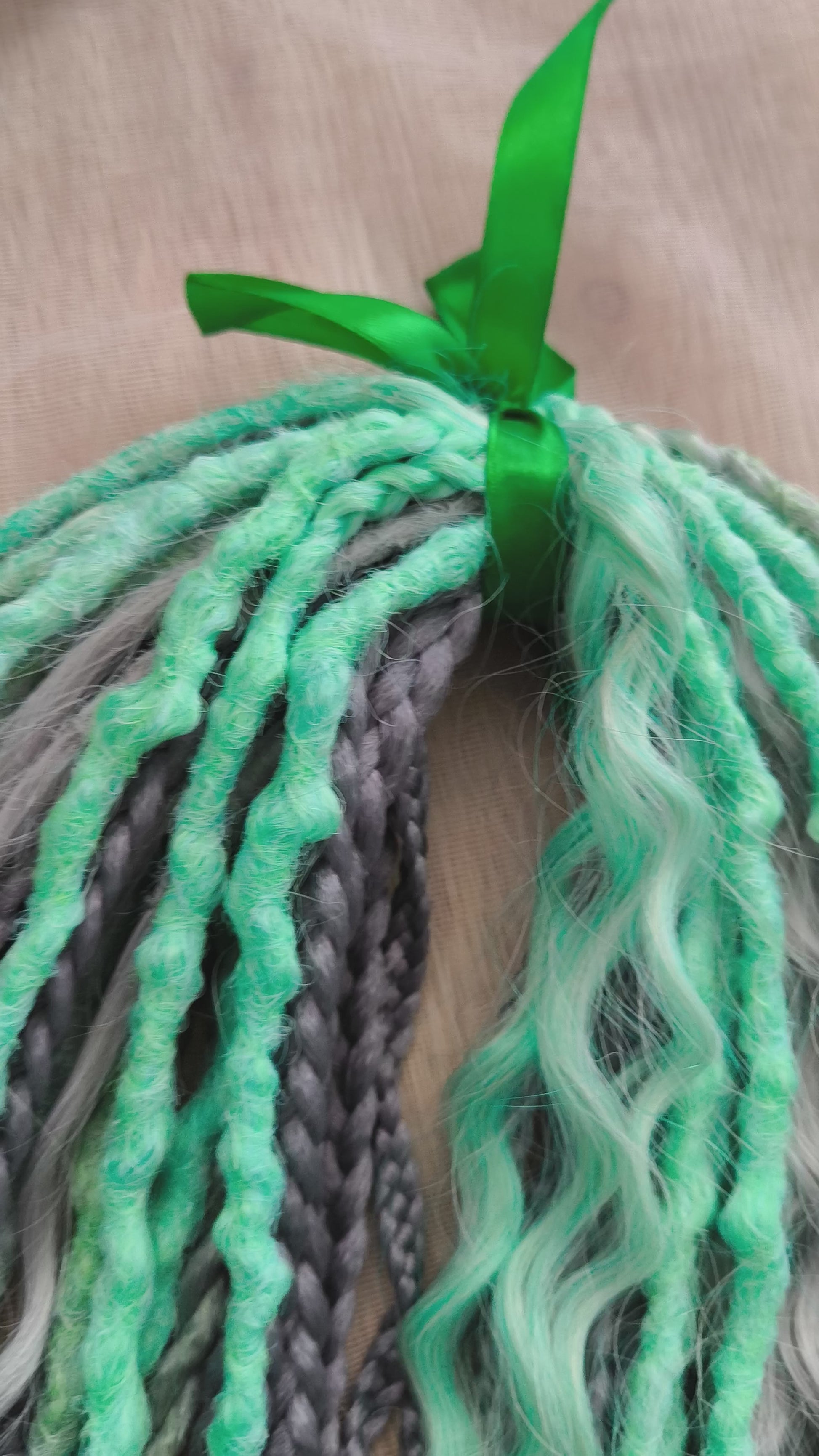 Mix of silver grey and mint green synthetic partial set of 34 double ended dreads, braids, dreaded curls.