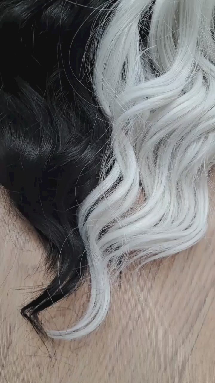 Black & White soft, lightweight, and reusable 60 double ended synthetic standard dreaded brushable curls

Length: 16 inches (40 cm)
Dreaded part: approximately 3-4 inches (8-10 cm)
Weight: ±300 gr (10,6 oz)