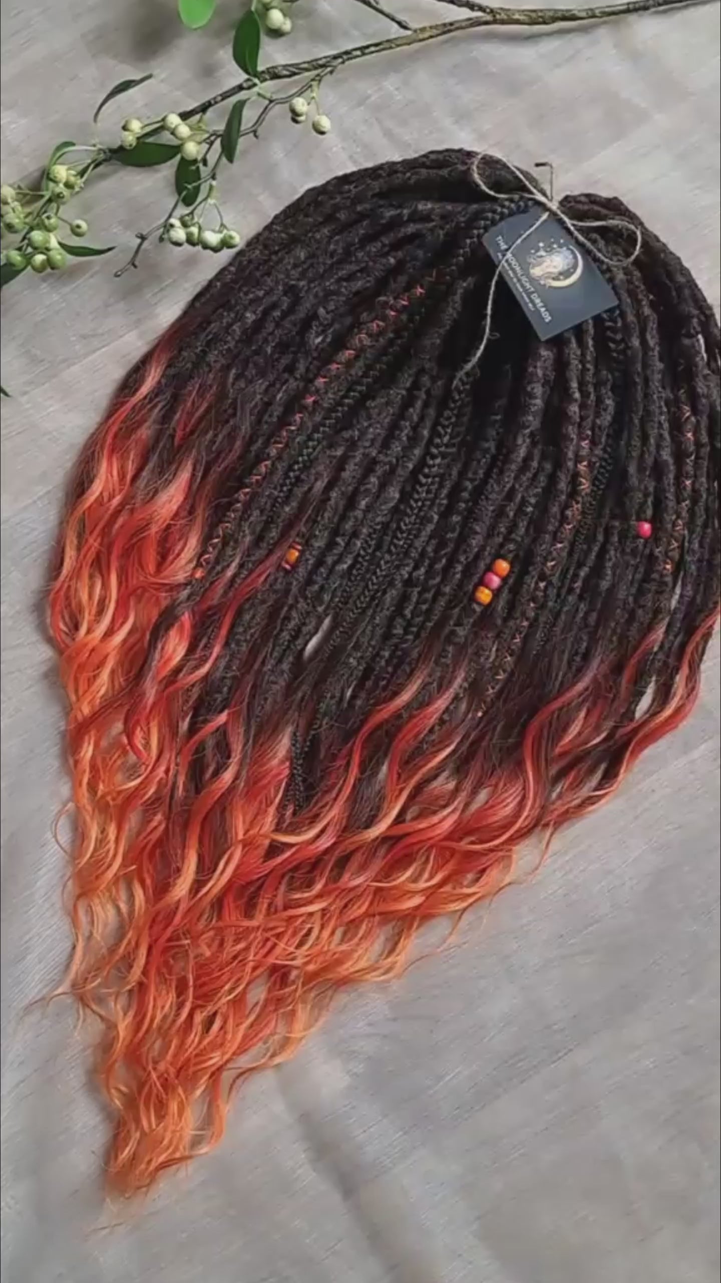 Phoenix - dark chocolate brown and fiery red soft, lightweight, reusable synthetic 50 double ended crochet dreads, with curly brushable ends 

Length: ±28-30 inches (73-75 cm)
Thickness of dreads: ±0.8-1 cm
Weight: ±410 gr (14,5 oz)