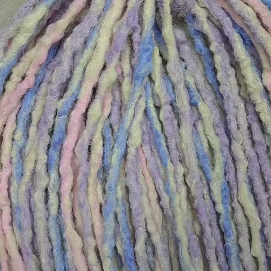 Pastel Cloud - a soft pastel mix of lavender, baby blue, blush pink, and creamy blonde. Soft, lightweight, and reusable 49 double ended synthetic bumpy dreadlocks with blunt ends give a calm, airy look.

Length: ≈15-16 inches (≈38-40 cm)
Thickness of dreads and braids: ≈0.8-1 cm
Weight: ≈260 gr (≈9,17 oz)