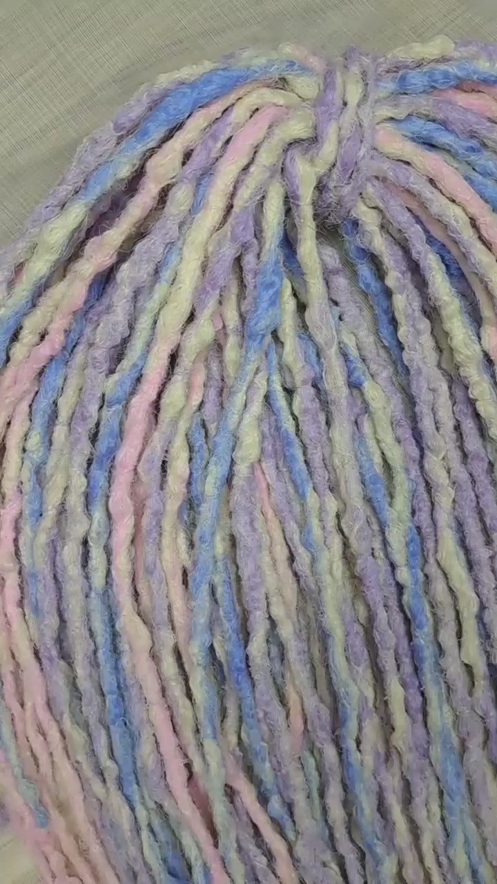 Pastel Cloud - a soft pastel mix of lavender, baby blue, blush pink, and creamy blonde. Soft, lightweight, and reusable 49 double ended synthetic bumpy dreadlocks with blunt ends give a calm, airy look.

Length: ≈15-16 inches (≈38-40 cm)
Thickness of dreads and braids: ≈0.8-1 cm
Weight: ≈260 gr (≈9,17 oz)