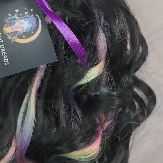 Black Rainbow - 60 DE soft, lightweight, and reusable synthetic standard dreaded brushable curls Manasi. Black base blended with rainbow/prism/glitch effect accents. 

Length: 16 inches (40 cm)
Dreaded part: approximately 3-4 inches (8-10 cm)
Weight: ±300 gr (10,6 oz)
