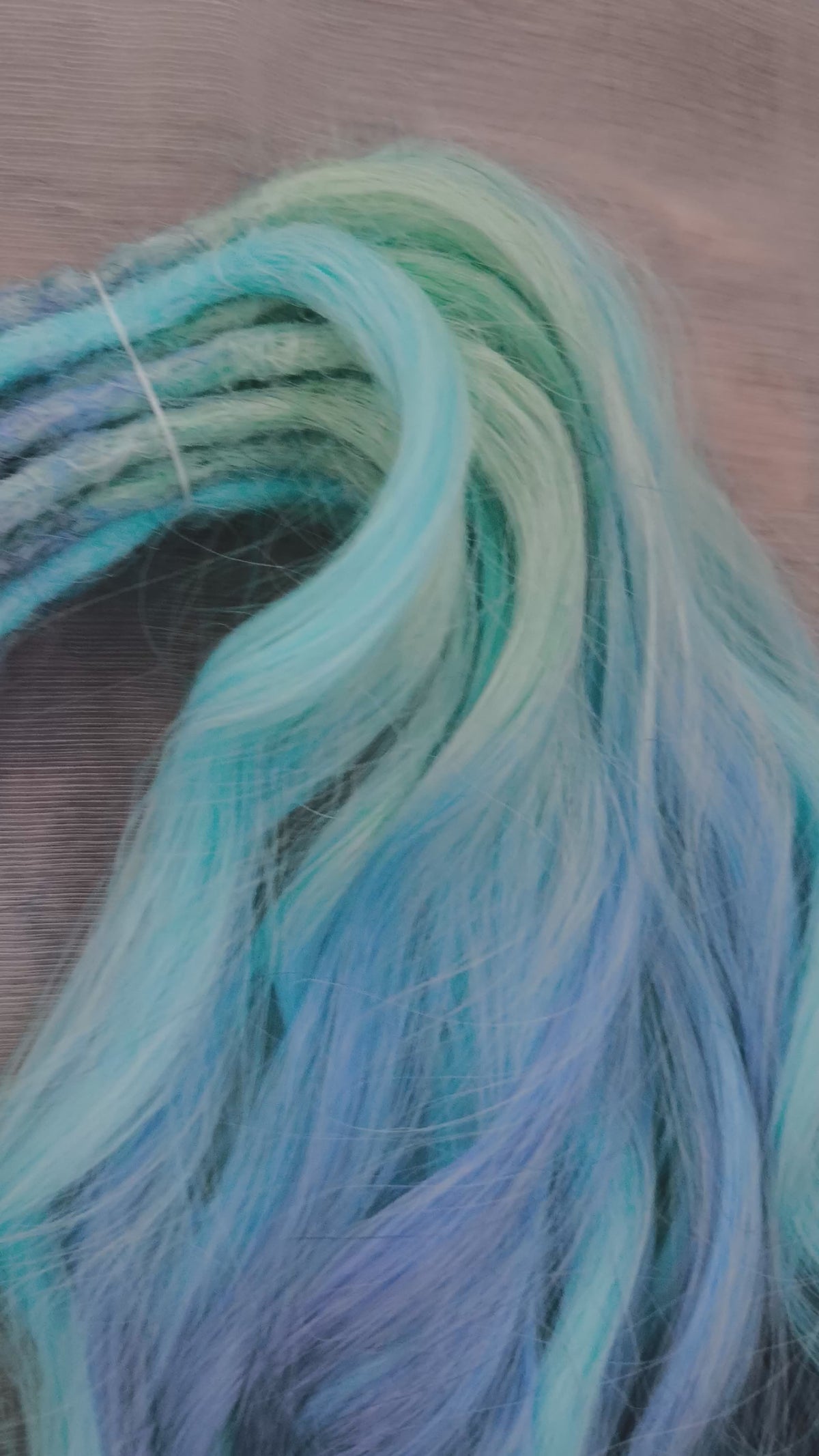 Blue Iris - soft, lightweight, and reusable; this set combines purple, cool blue, and deep navy brushable, synthetic double ended wavy dreadlocks.
