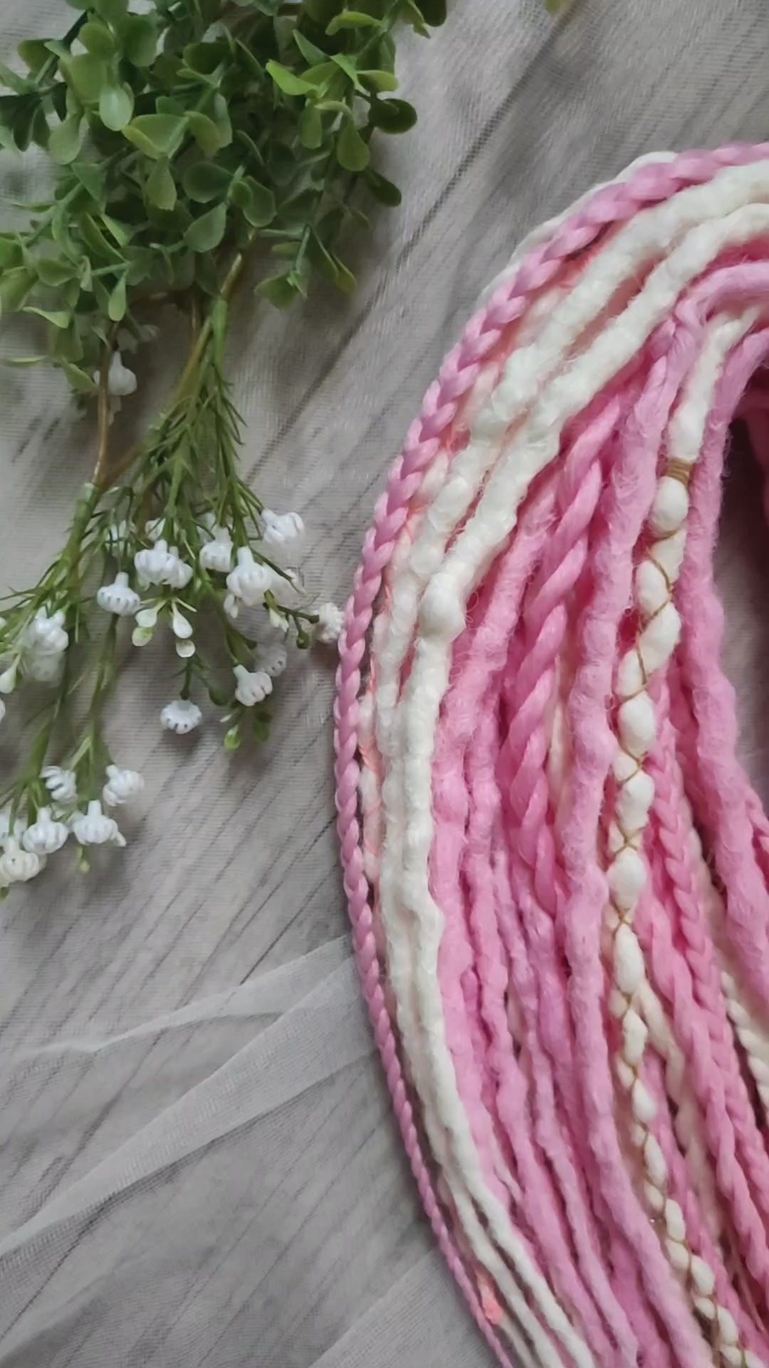 A soft blend of creamy white and gentle pink tones double ended crochet bumpy dreads, braids, and Senegalese twists. Decoration is included. Reusable lightweight set made from high-quality synthetic hypoallergenic material kanekalon.

Standard length: ±22-24 inches (55-60 cm)
Thickness of dreads and braids: ±0.8 cm
