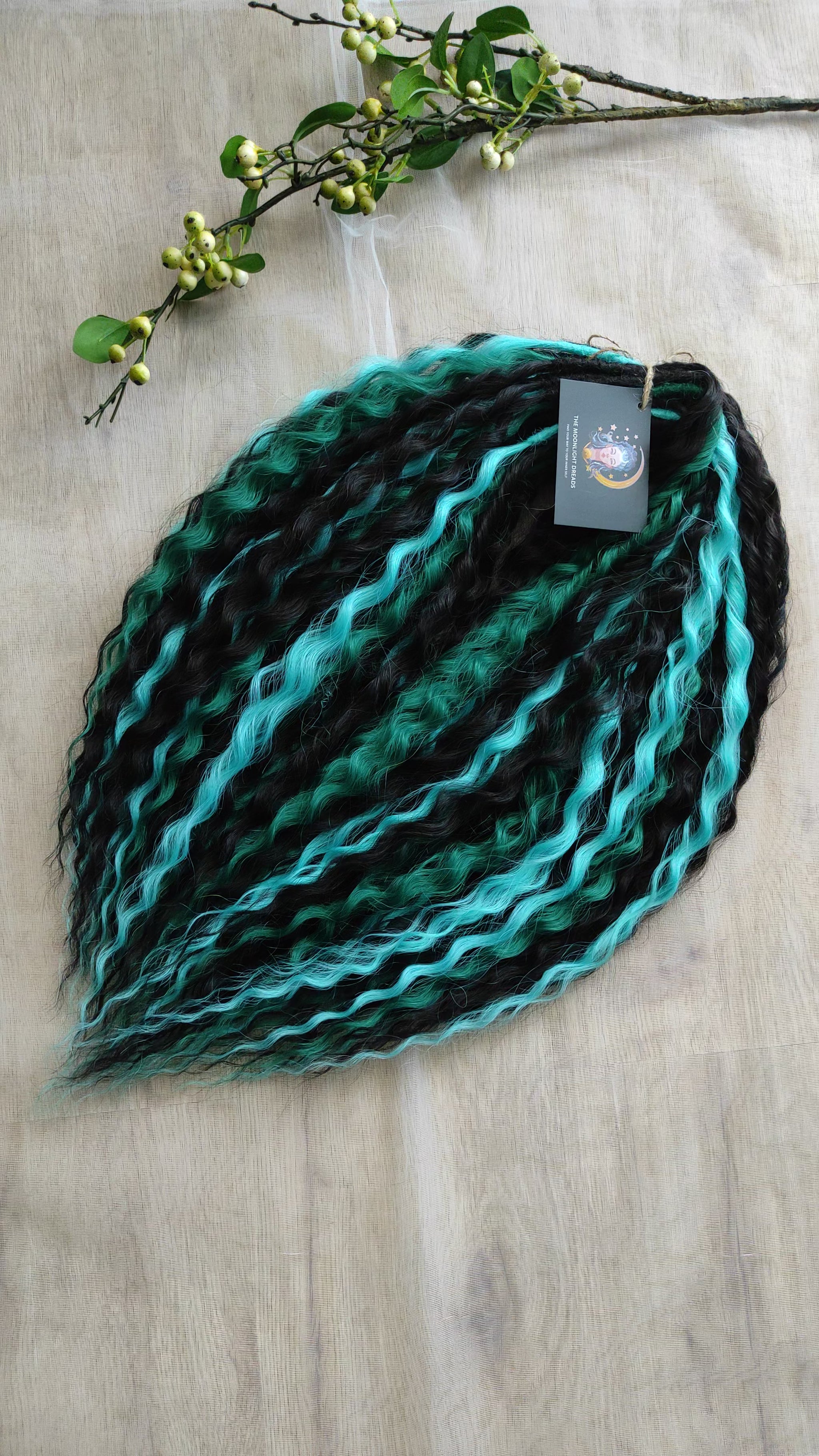 Midnight Tide - a deep mix of almost-black brown, emerald green, and teal/aqua green - dark, rich, and full of depth. Soft, lightweight, and reusable synthetic double ended NON-BRUSHABLE curls.