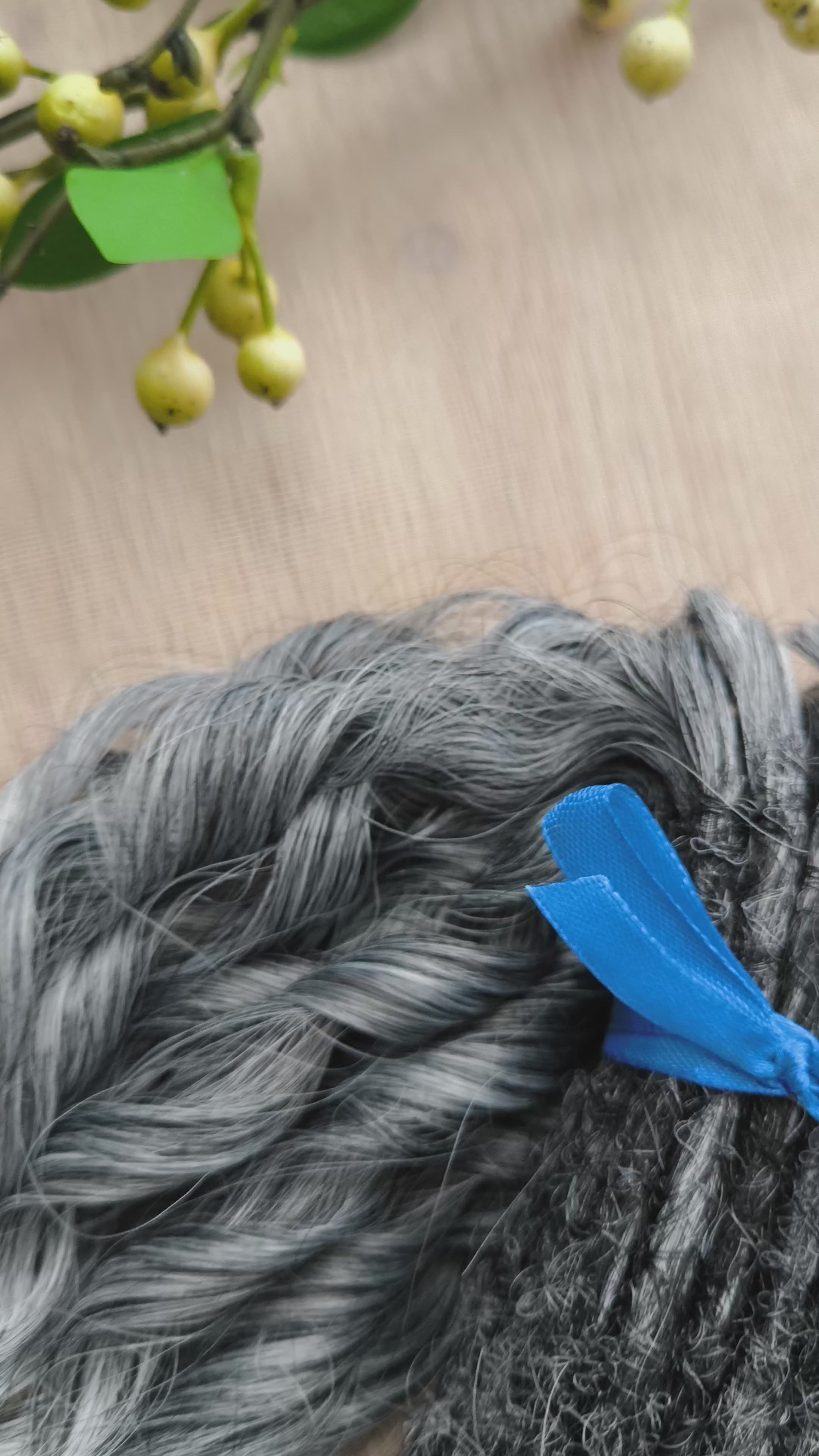 Salt and pepper: ombre from dark grey to white, natural-looking, short Jessica regular dreaded curls. The length is 10 inches (25 cm), dreaded part ±3-4 inches.