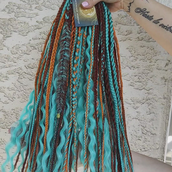 Ginger Sky: soft, lightweight, and reusable double ended synthetic dreads, braids, and regular dreaded non-brushable curls. A mix of turquoise green, red, copper, and orange colours.

The length is 22-24 inches (55-60 cm)
Dreaded part of curls: 3-4 inches
Thickness of dreads and braids ±0.8 cm