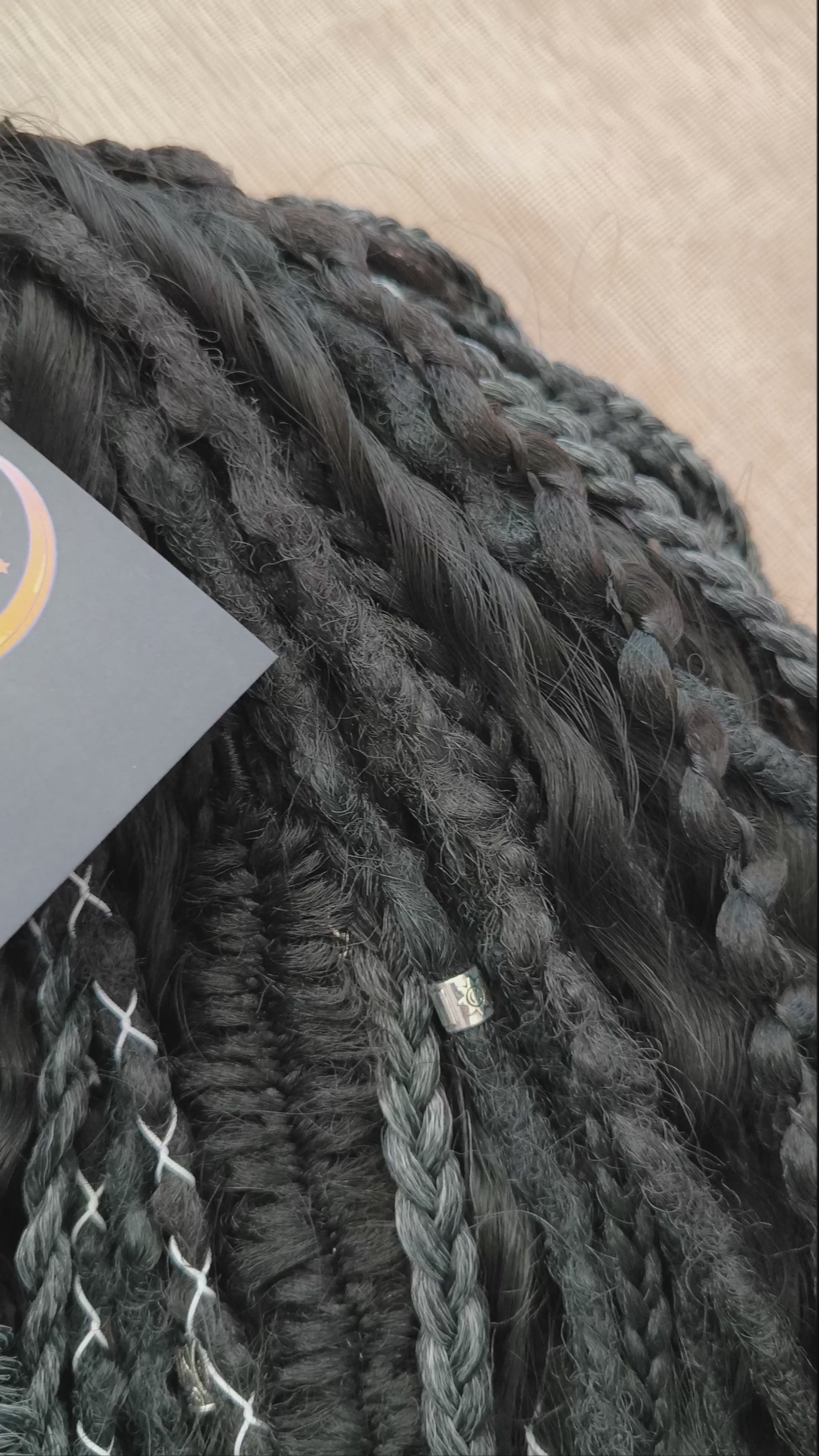 Pagan Witch — black, gray, and white/blonde set of 55 double ended synthetic bumpy dreads, braids, Senegalese twist, and dreaded curls (decoration is included). Reusable lightweight set made from high-quality synthetic hypoallergenic material kanekalon.

Standard length: ±22-24 inches (55-60 cm)
Thickness of dreads and braids: ±0.6-0.8 cm
Dreaded part of curls ±3-4 inches (8-10 cm)
Weight with decoration: ±310 gr (11 oz)