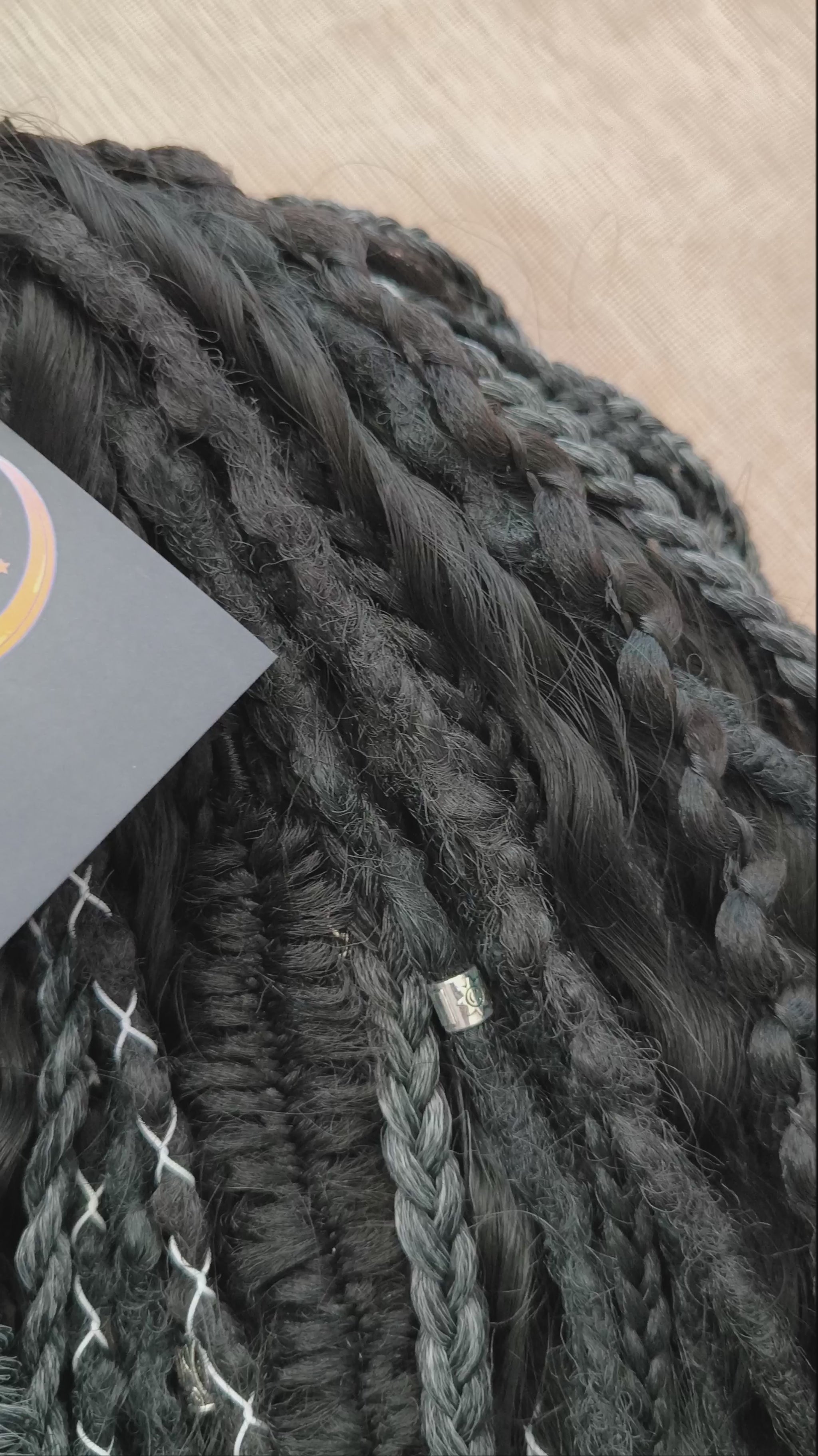 Pagan Witch — black, gray, and white/blonde set of 55 double ended synthetic bumpy dreads, braids, Senegalese twist, and dreaded curls (decoration is included). Reusable lightweight set made from high-quality synthetic hypoallergenic material kanekalon.

Standard length: ±22-24 inches (55-60 cm)
Thickness of dreads and braids: ±0.6-0.8 cm
Dreaded part of curls ±3-4 inches (8-10 cm)
Weight with decoration: ±310 gr (11 oz)