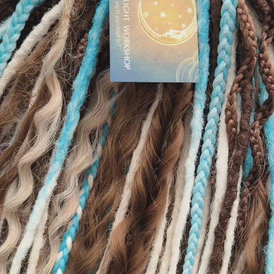 A calm mix of cocoa brown, creamy blonde, and bright blue accents - lightweight, &nbsp;reusable synthetic double ended crochet dreadlocks, curls, braids, and Senegalese twists.

Standard length: ±22-24 inches (55-60 cm)
Thickness of dreads and braids: ±0.8 cm
Dreaded part of curls ±8-10 cm (3-4 inches)