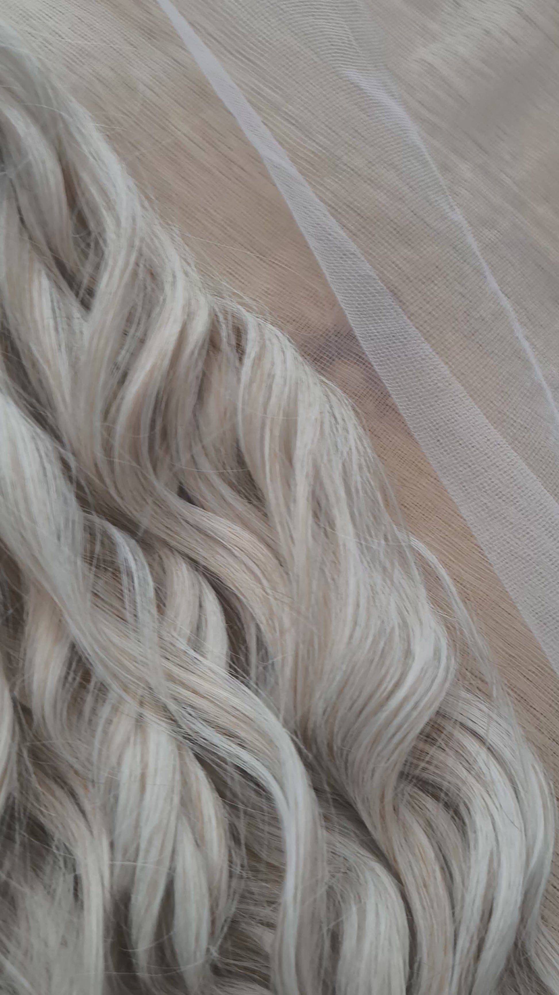 Platinum blonde soft, lightweight, and reusable synthetic brushable double ended wavy dreadlocks (regular dreaded, braided middle, or push-up).&nbsp;


The length:
Standard dreaded - 22-24 inches (55-60 cm), dreaded part ±4-5 inches
Braided middle - 22-24 inches (55-60 cm), braid ±4-5 inches folded (total ±8-10 inches)
Push-up / Dolly - 20-22 inches (50-55 cm), dreaded part ±4 inches (from working side)