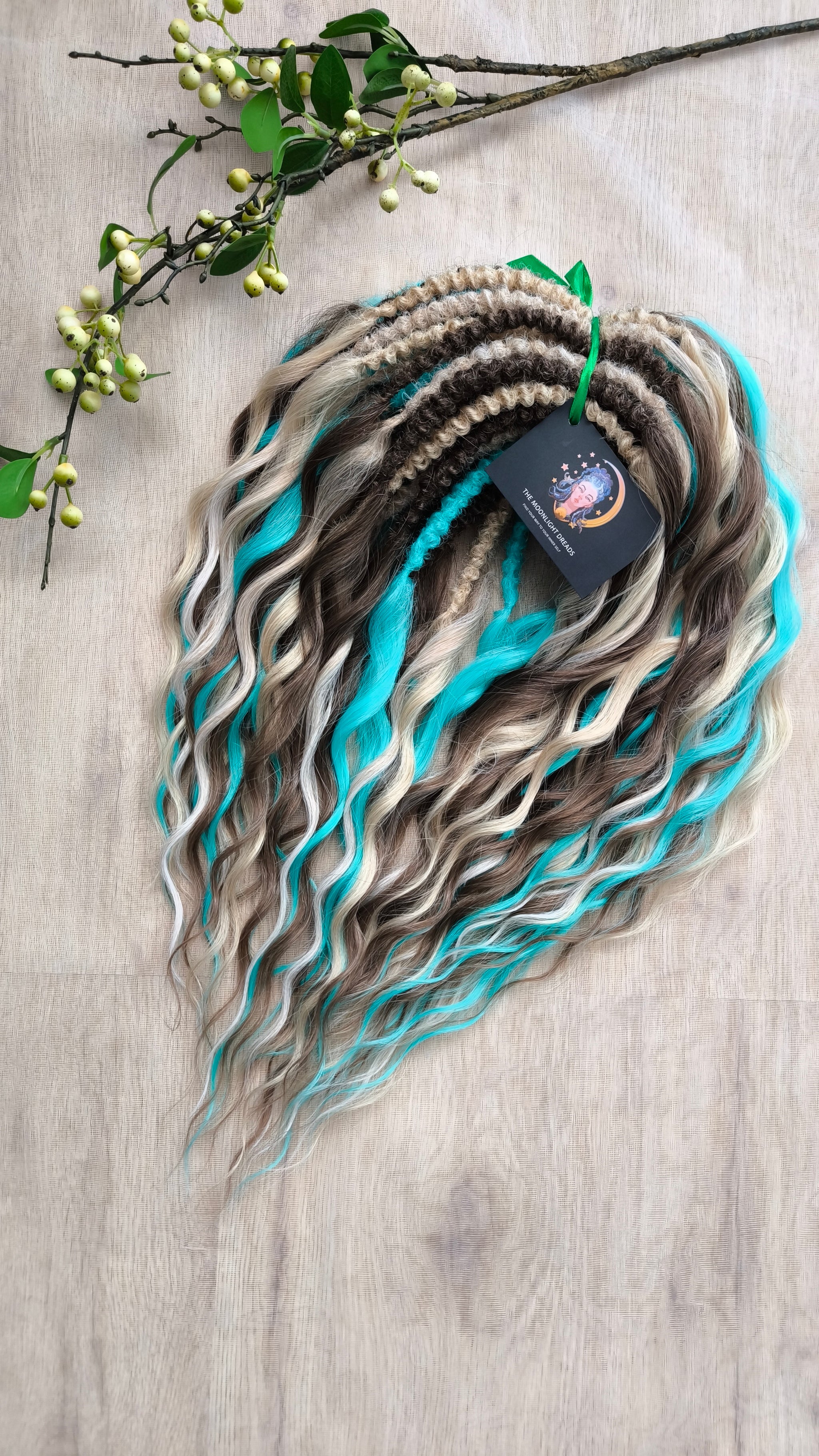 Brown, 2 shades of blonde, and turquoise green soft, lightweight, and reusable synthetic brushable double-ended wavy dreadlocks (regular dreaded or push-up)