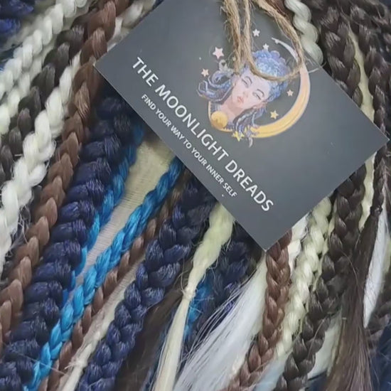 Blue Chocolate: set of braided middle curls and regular braids in a deep mix of dark chocolate tones with white, icy blue and navy accents. Soft, lightweight, and reusable.

Standard length: ±22-24 inches (55-60 cm)
Thickness of braids: ±0.8 cm
Braided part of curls: ±4–5 inches folded (total ±8–10 inches)