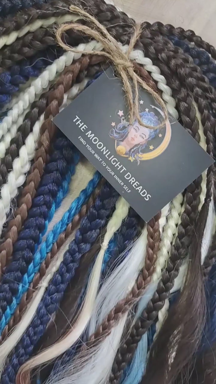 Blue Chocolate: set of braided middle curls and regular braids in a deep mix of dark chocolate tones with white, icy blue and navy accents. Soft, lightweight, and reusable.

Standard length: ±22-24 inches (55-60 cm)
Thickness of braids: ±0.8 cm
Braided part of curls: ±4–5 inches folded (total ±8–10 inches)