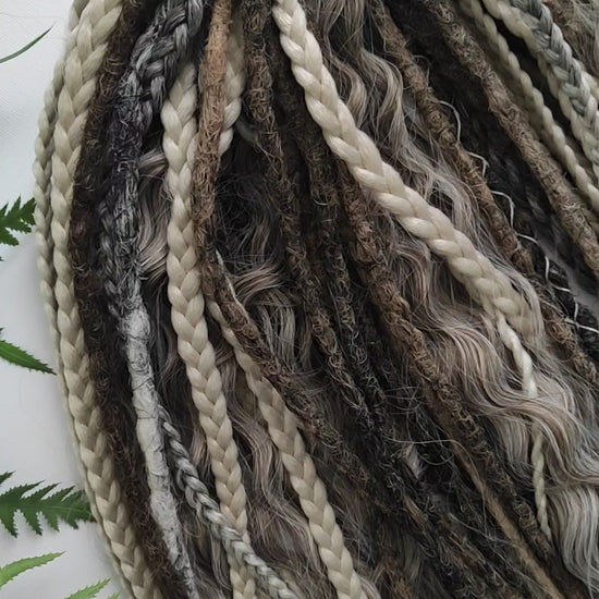 A mix of browns and ash blonde - lightweight,  reusable synthetic double ended crochet dreadlocks, non-brushable curls, braids, and Senegalese twists.
