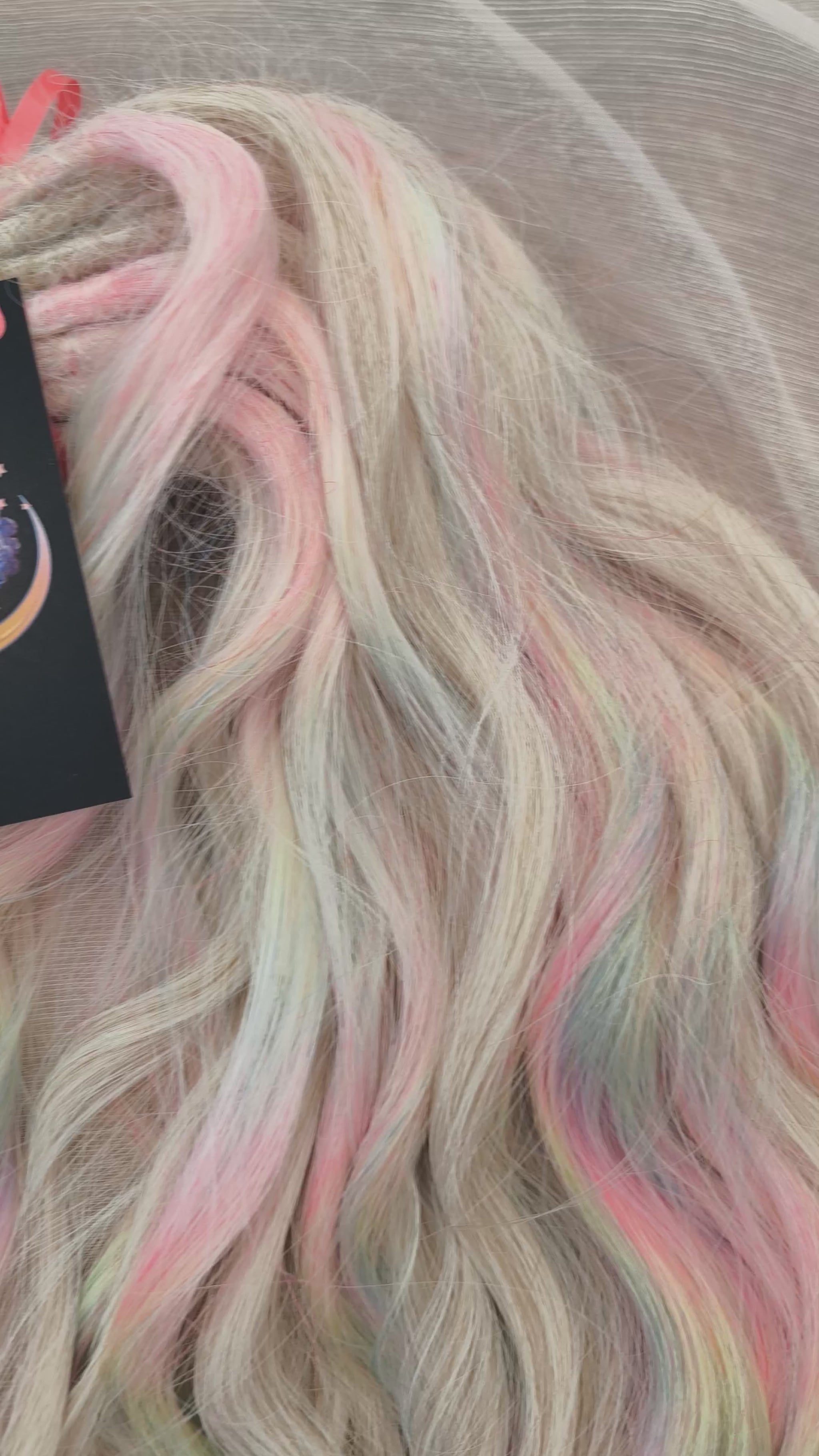 Fairy Dust - 50 DE soft, lightweight, and reusable synthetic standard dreaded brushable curls. A mix of platinum blonde and pastel rainbow/prism