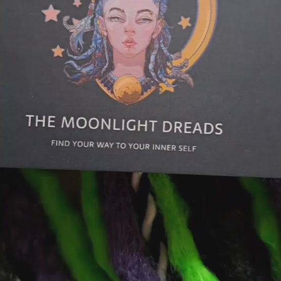 "Beetlejuice" - 50 DE Black, purple, and vibrant green synthetic set of double ended crochet textured dreads and Senegalese twists.

Standard length: ±22-24 inches (55-60 cm)
Thickness of dreads and braids: ±0.8-1 cm
Weight: ±315 gr (11 oz)