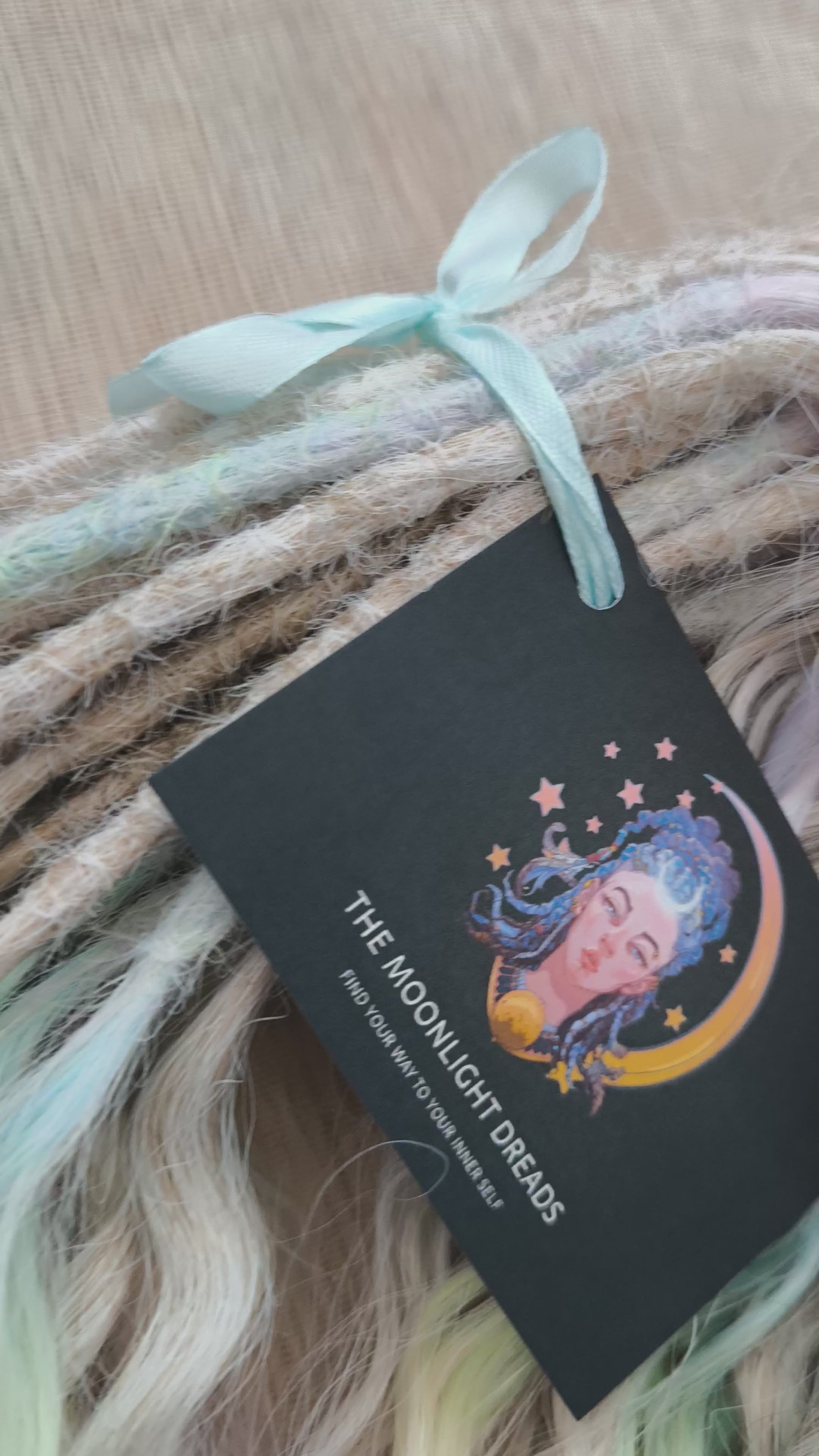 Pastel Unicorn: the mix of Platinum Blonde (2/3 parts of blonde) + and Pastel Rainbow/glitch/prism effect (1/3 part of rainbow) soft, lightweight, and reusable synthetic brushable double ended wavy dreadlocks (NOT BRUSHABLE)