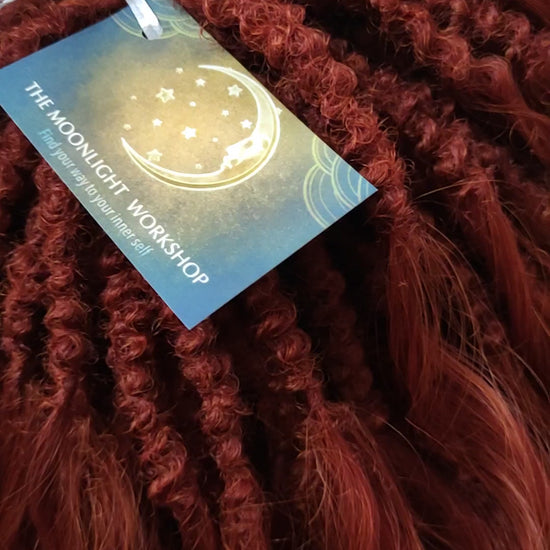 This rich, earthy shade of deep rusty red blends fiery energy with natural elegance — perfect for those who want a bold yet grounded look. Soft, lightweight, and reusable synthetic dreaded curls (standard dreaded, braided middle or push-up). Natural-looking waves let you brush these curls, which keeps them looking good longer!
