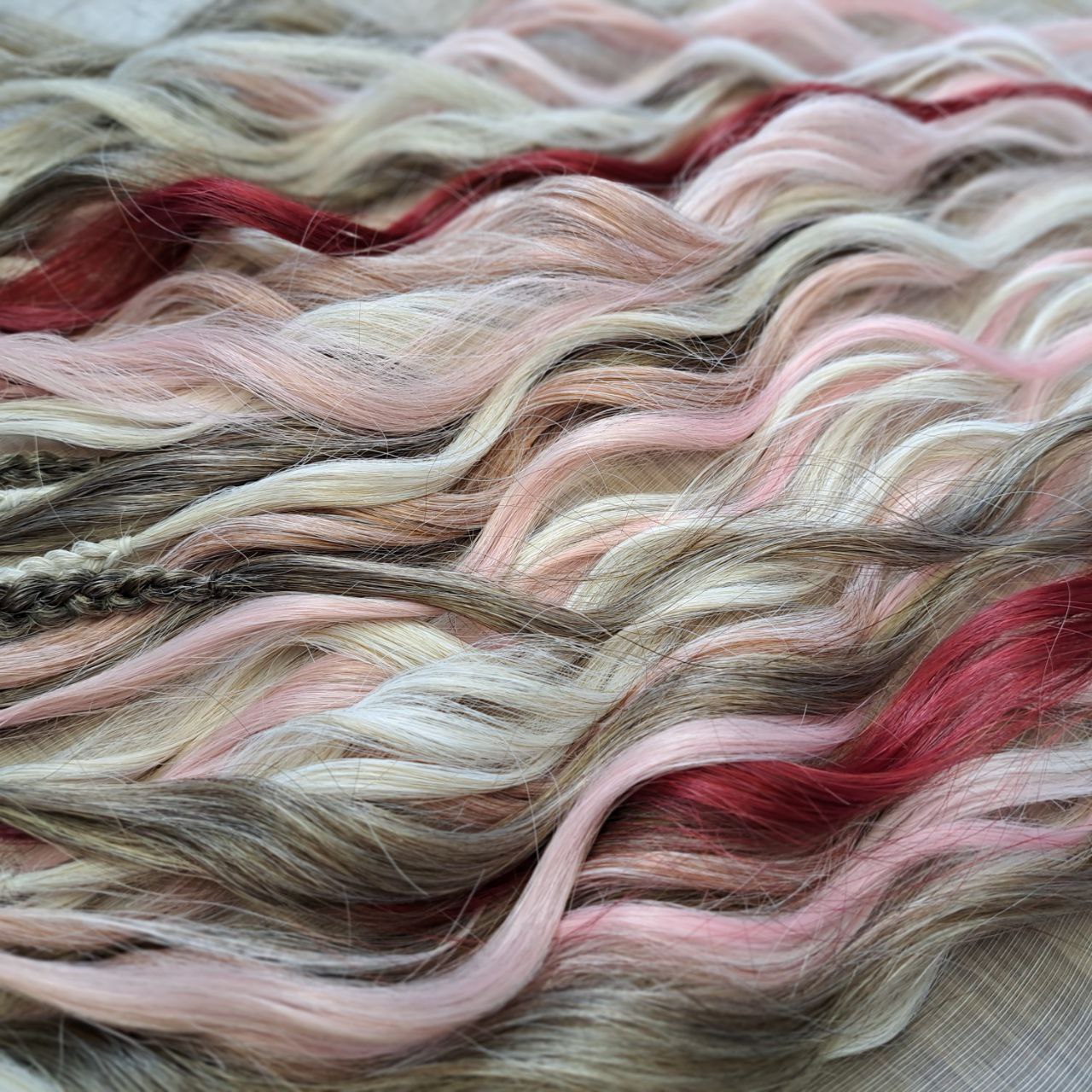Soft, lightweight, and reusable synthetic brushable double ended wavy dreadlocks (regular dreaded or push-up). Mix of a few colors: platinum and ombre wheat blondes, various pink, and burgundy.