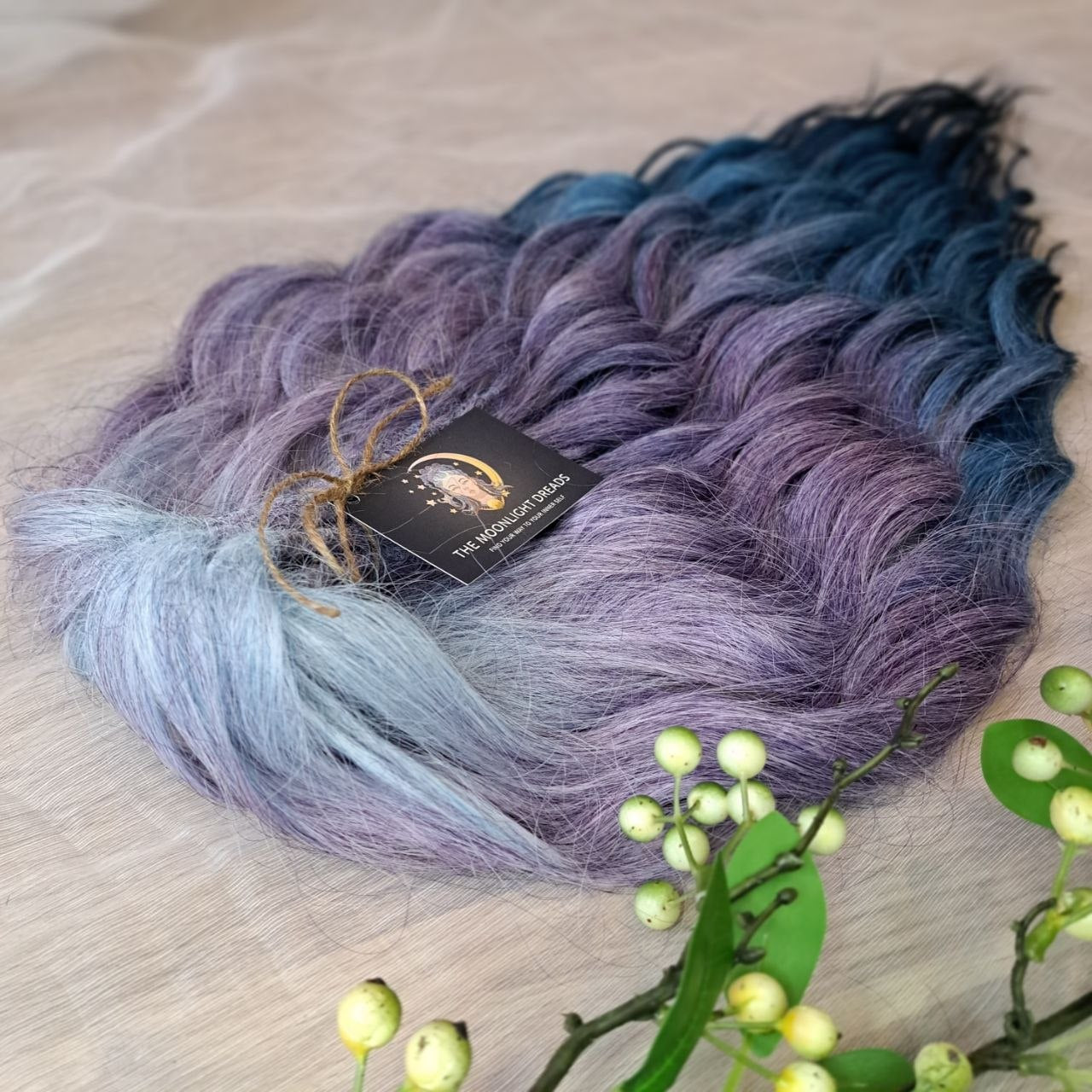 This set features a smooth lavender-to-indigo gradient with cool, clean tones and a soft transition between shades. Soft, lightweight, and reusable double ended synthetic brushable curls.