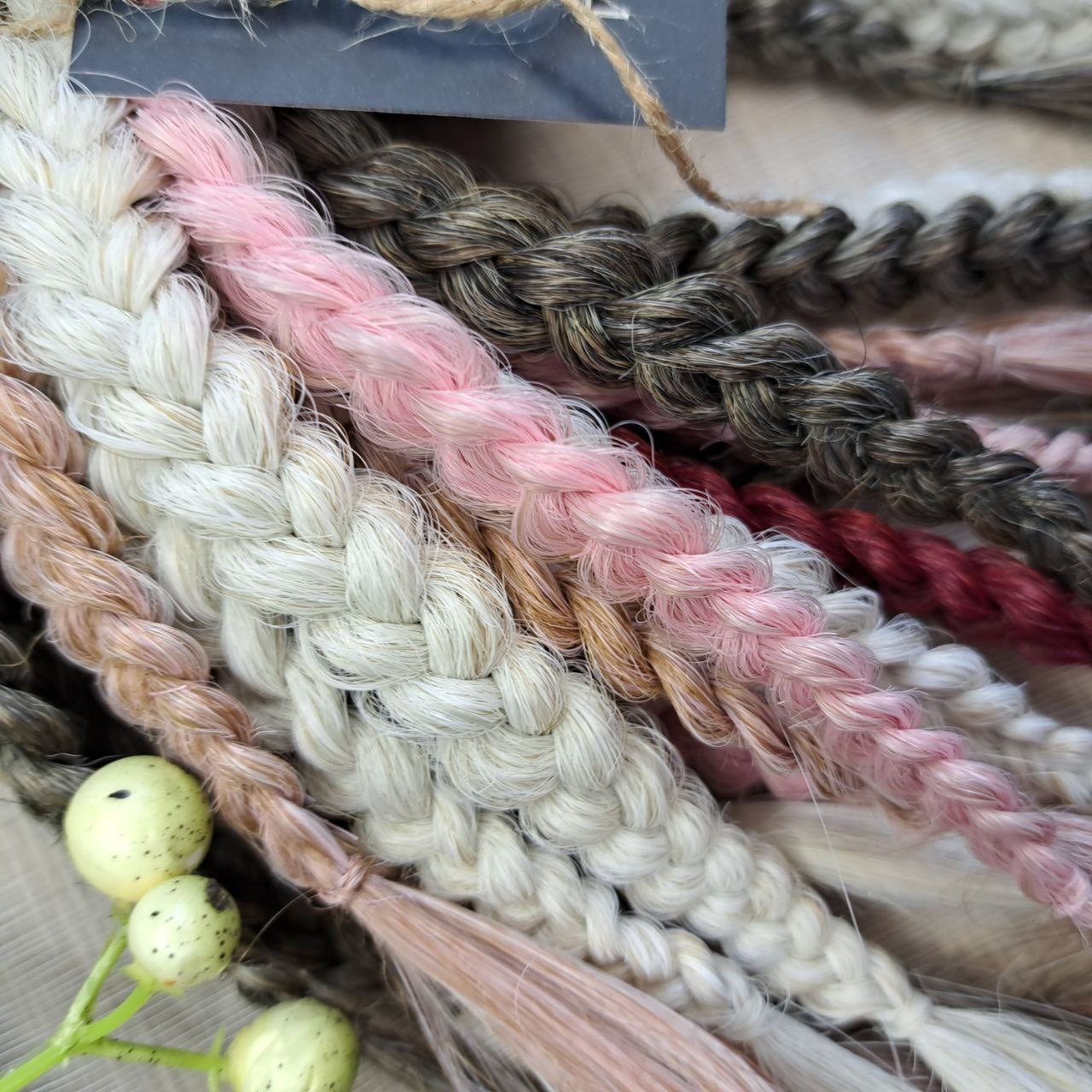 Soft, lightweight, and reusable synthetic brushable double ended wavy dreadlocks (regular dreaded or push-up). Mix of a few colors: platinum and ombre wheat blondes, various pink, and burgundy.