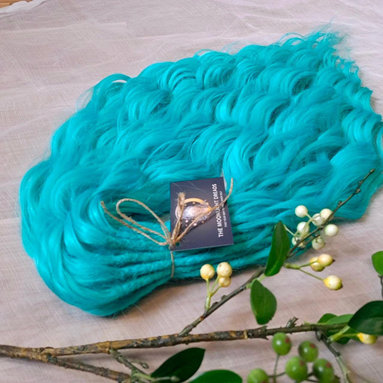 Turquoise green soft, lightweight, and reusable synthetic brushable daouble-ended wavy dreadlocks (regular dreaded, braided middle or push-up).