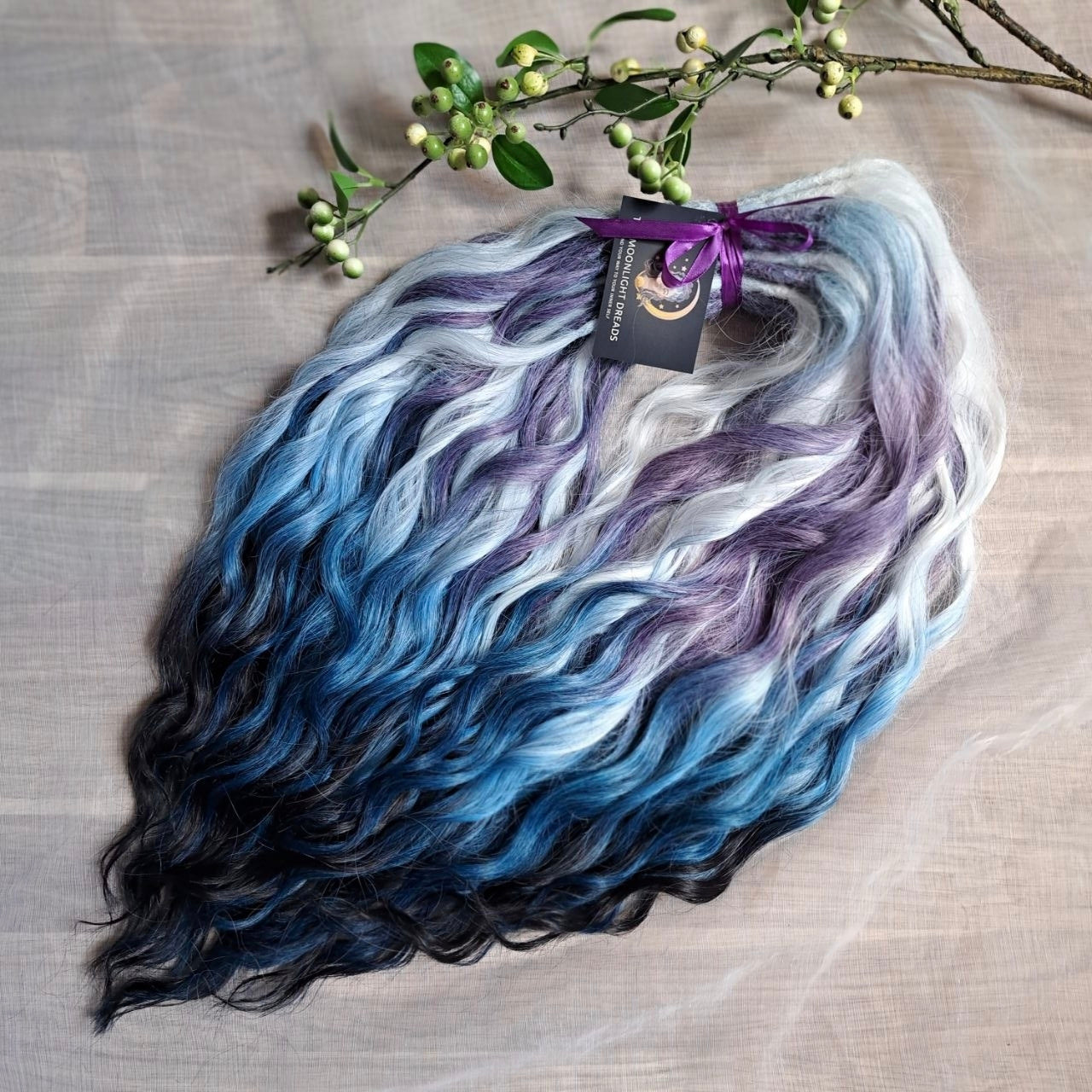 This set blends soft lilac, icy blonde, cool blue, and deep navy into a clean, cold-toned gradient. Lightweight, brushable, and reusable synthetic double-ended wavy dreadlocks with a smooth transition between shades.
Perfect for those who prefer crisp, cool colors and a fresh winter-inspired look.