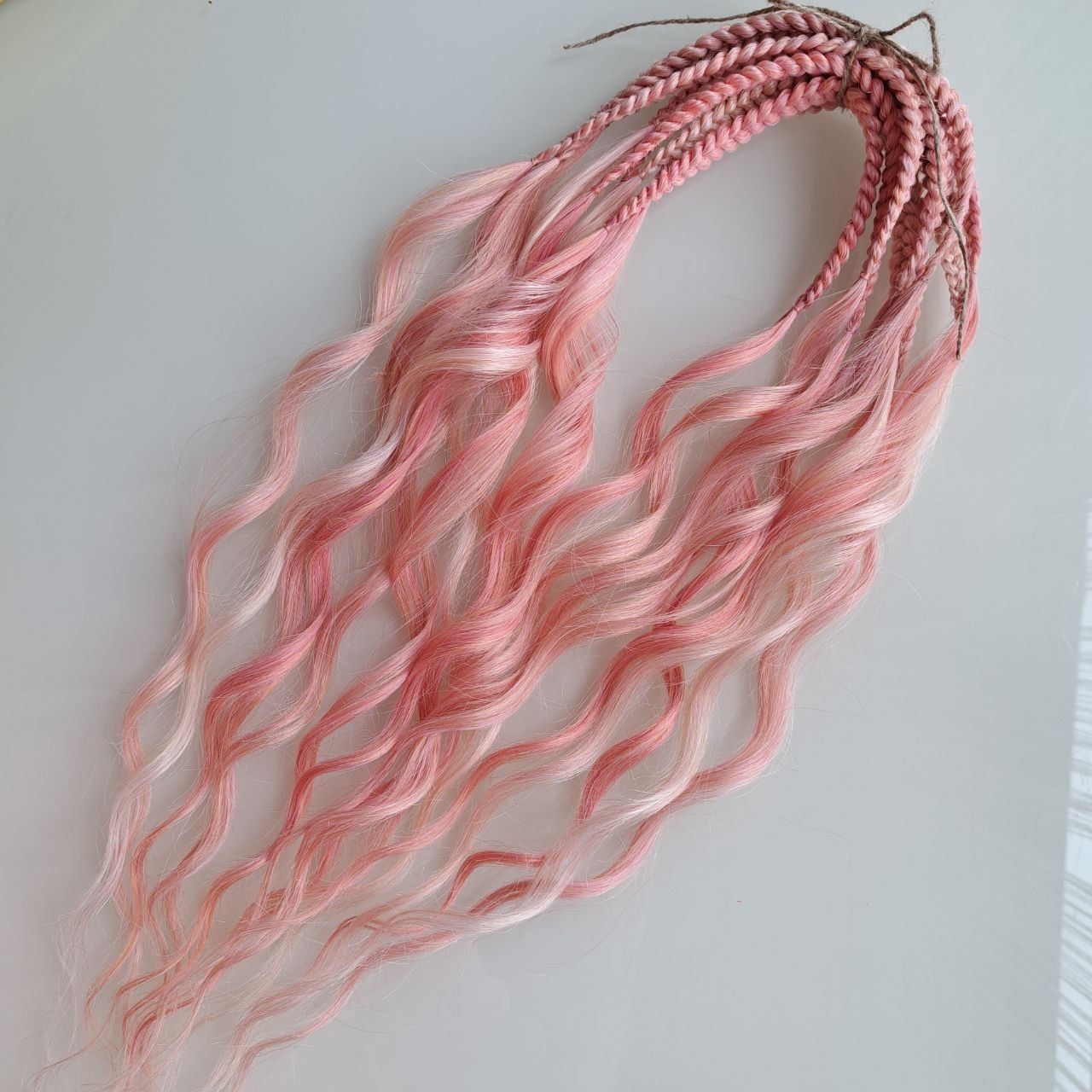 Pink Flamingo - a mix of a few coral pink and pinky blonde shades. Soft, lightweight, and reusable synthetic brushable double ended wavy dreadlocks (regular dreaded, braided middle, or push-up):

The length:
Standard dreaded - 22-24 inches (55-60 cm), one-side dreaded part ±4-5 inches
Braided middle - 22-24 inches (55-60 cm), braid ±4-5 inches folded (total ±8-10 inches)
Push-up / Dolly - 20-22 inches (50-55 cm), dreaded part ±4 inches (from working side)