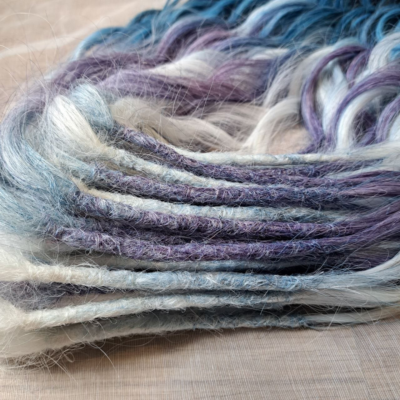 This set blends soft lilac, icy blonde, cool blue, and deep navy into a clean, cold-toned gradient. Lightweight, brushable, and reusable synthetic double-ended wavy dreadlocks with a smooth transition between shades.
Perfect for those who prefer crisp, cool colors and a fresh winter-inspired look.
