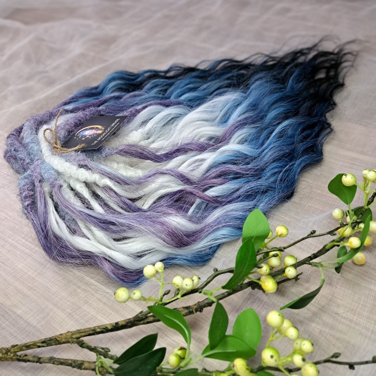 This set combines soft lilac, icy blonde, cool blue, and deep navy into a clean, cold-toned gradient. Lightweight, brushable, and reusable synthetic double-ended wavy dreadlocks with a smooth transition between shades.
Perfect for those who prefer crisp, cool colors and a fresh winter-inspired look.

📏 The length:
Standard dreaded: 22–24 inches (55–60 cm), dreaded part ±3–4 inches
Braided middle: 22–24 inches (55–60 cm), braid ±4–5 inches folded (total ±8–10 inches)
Push-up / Dolly: 20–22 inches (50–55 cm)