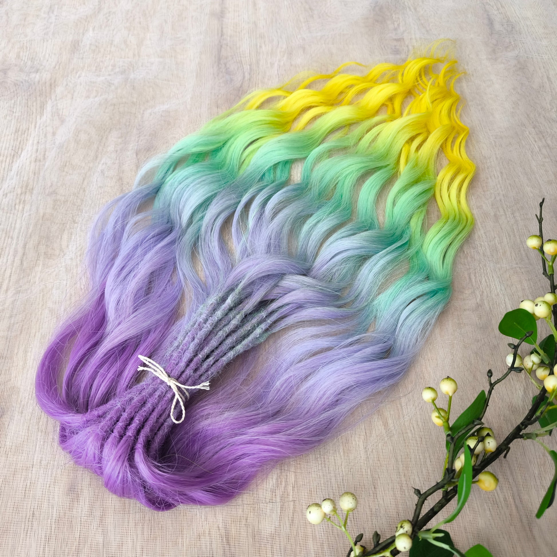 Colorful Rainbow prism (ombre from purple to green and yellow), soft, lightweight, and reusable synthetic sets of wavy double ended brushable dreadlocks (regular dreaded or push-up).