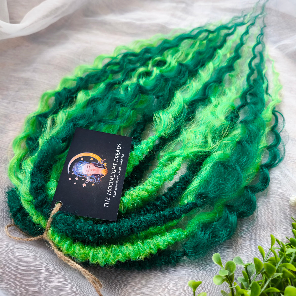 Emerald Moss - a mix of emerald and neon green. Soft, lightweight, and reusable synthetic double ended NON-BRUSHABLE curls